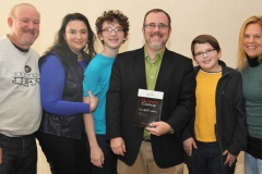 Rabbi David Fine (center) with family and Bernie and Beth Kotek