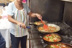 Rena shows us how it's done, sauteeing veggies for shakshuka