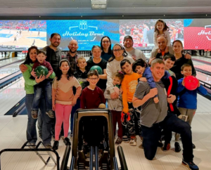 Families who are members of Temple Israel in New Jersey are enjoying time B'yachad at a bowling activities