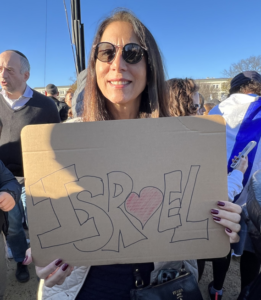 Temple Israel member with a Israel sign at the Rally for Israel in Washington DC